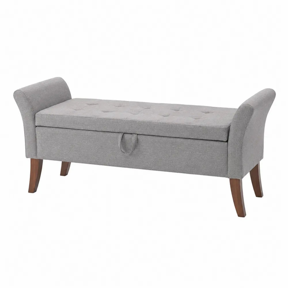 Banco de almacenamiento tapizado gris con patas de madera